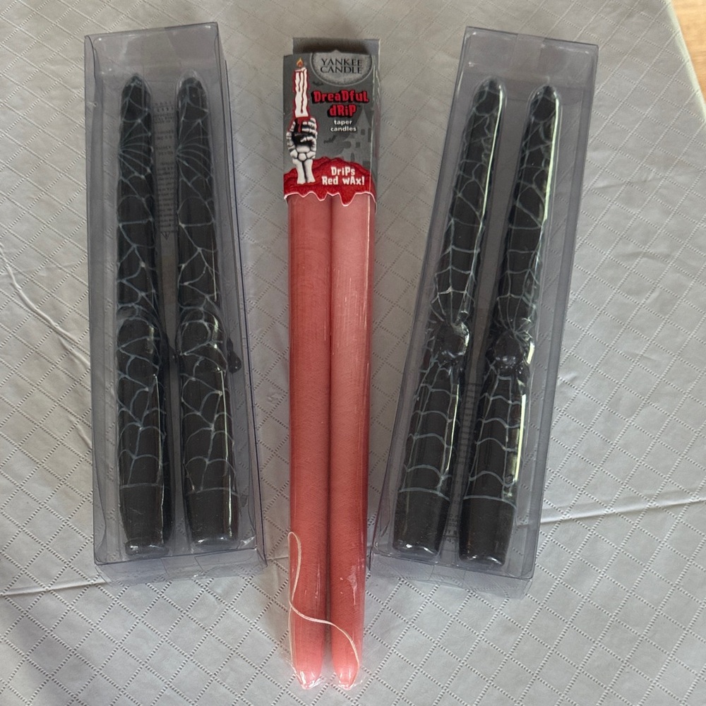 William Sonoma Black and Yankee Candle Red Drip Taper Candles